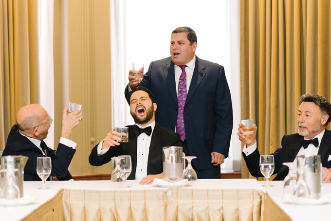 A photograph of Tisch, or the groom's table, at a Jewish wedding