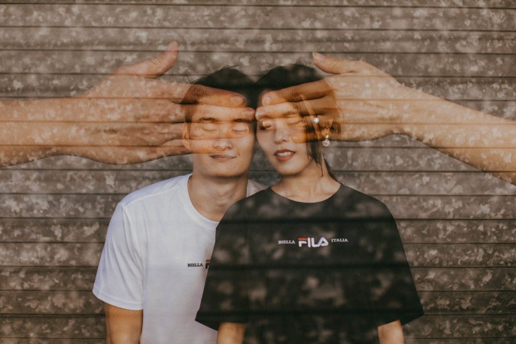 double exposure photo hands covering couple's eyes by jazreel hong justrealle photography singapore