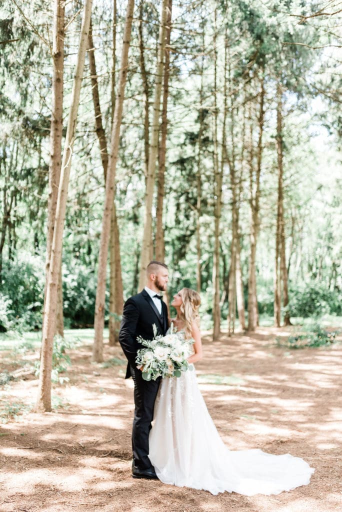 Posing in the forest from the First Look portraits session.