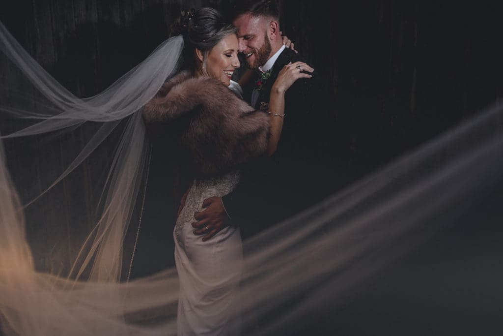 Denner's signature veil shot during dynamic portrait session.