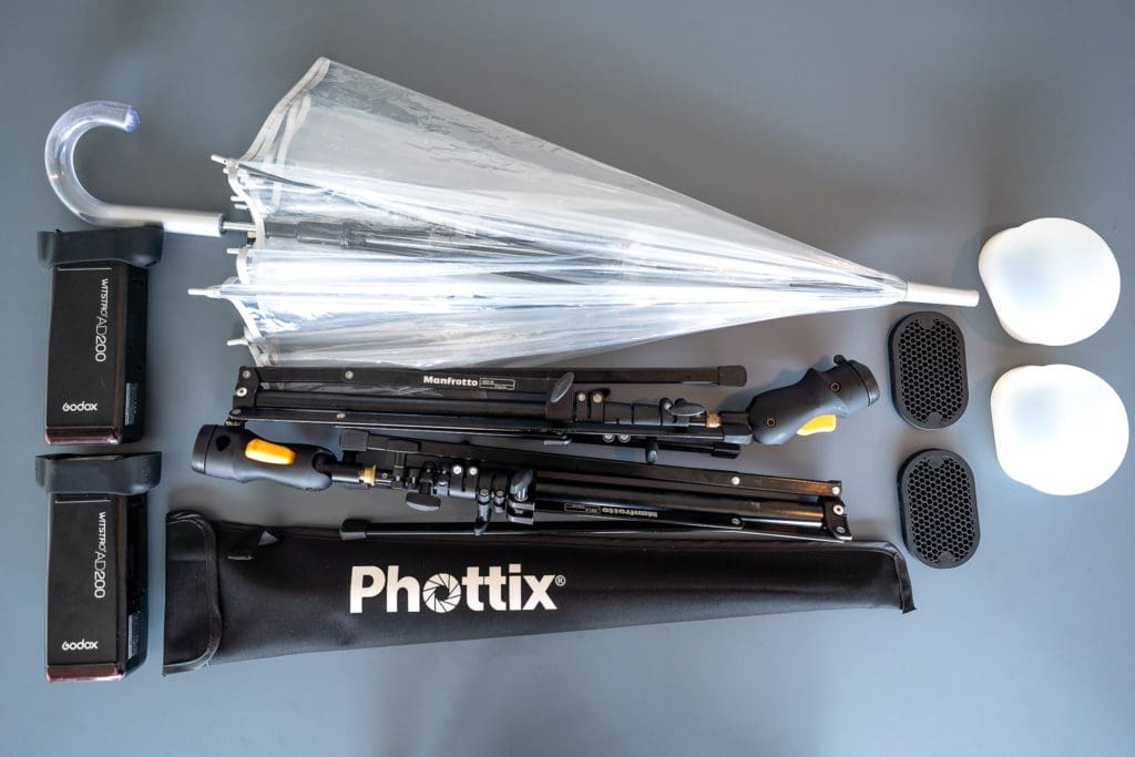 The gear: Phottix umbrella for off-camera flash shots to back light.