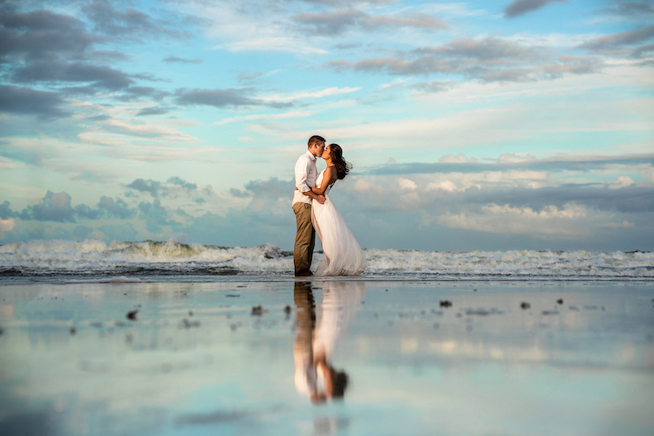 An eye-catching portrait of a couple on a beach in Florida.