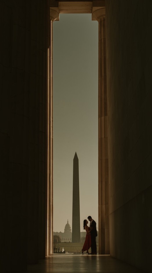 Couple framed with the U.S. Capitol in background.
