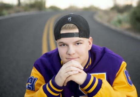 high school senior portrait in road