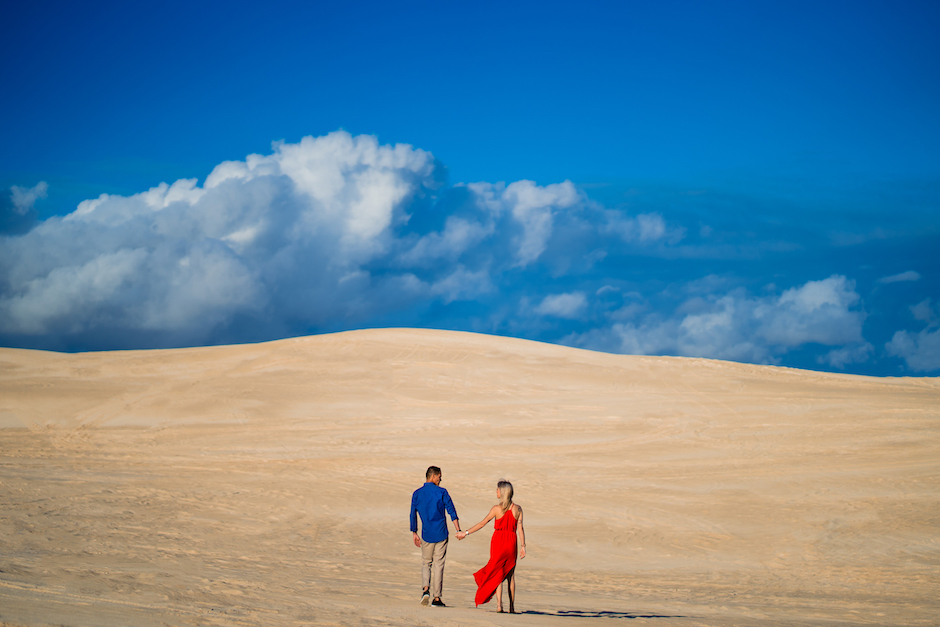 A grand landscape with couple backlit, by Jacob Gordon.