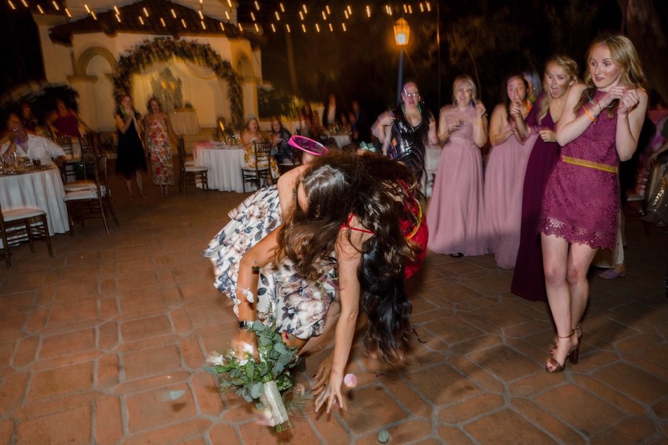 wedding portraits often include the bouquet toss. Here Kate Hampson shows what happens.
