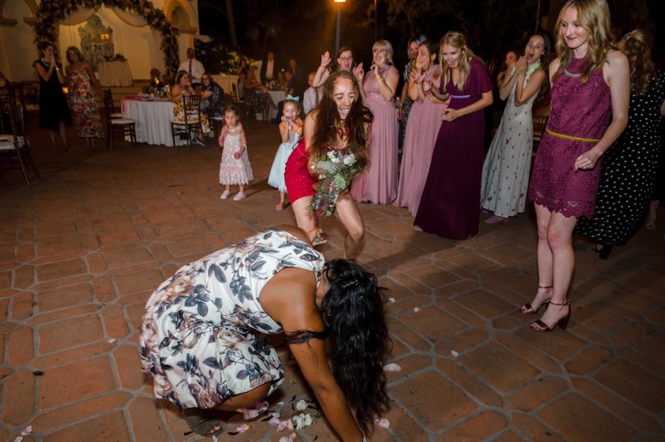 A winner in the bouquet toss emerges.