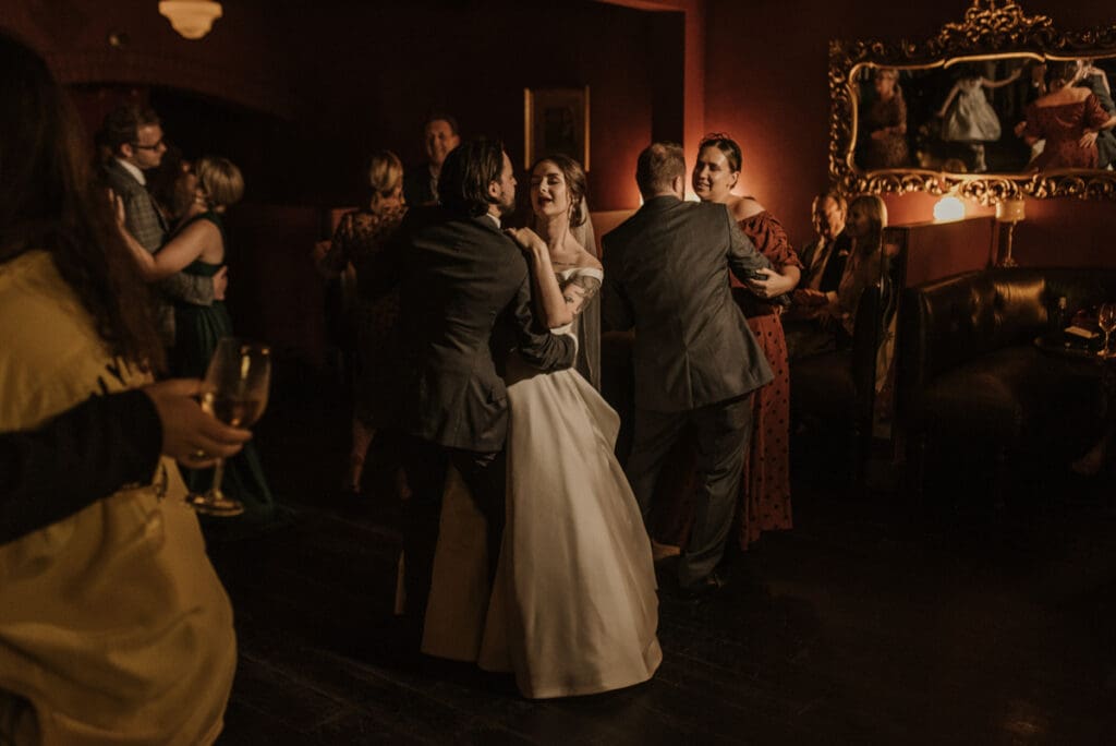 renaissance art lighting in wedding reception photo by dane tucker of the salty shutter