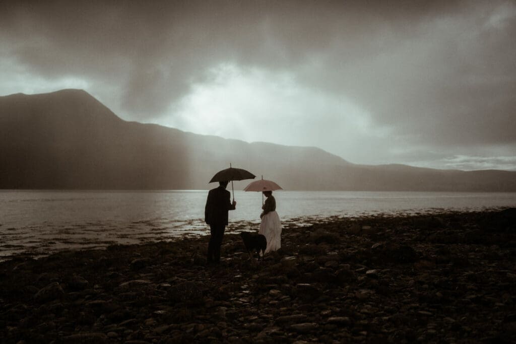 moody atmosphere outside with rain for couples portrait by emily black 30 rising star