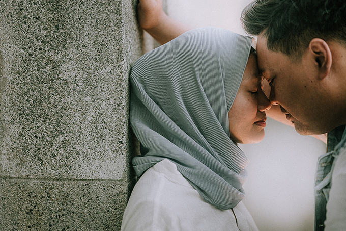 post-wedding portrait of couple outdoors in singapore in intimate space
