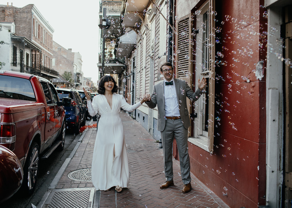 bride and groom surrounded by bubbles , eye-catching moment