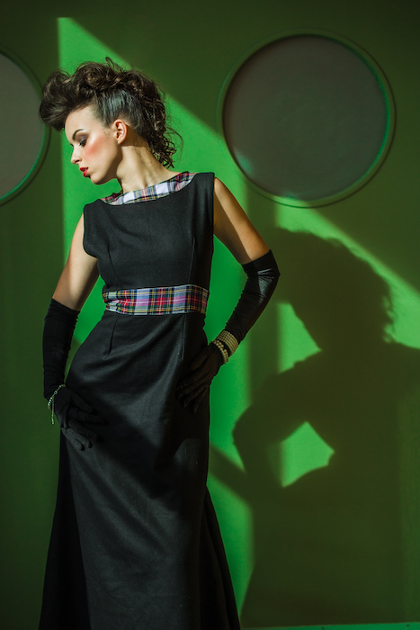 model against green wall