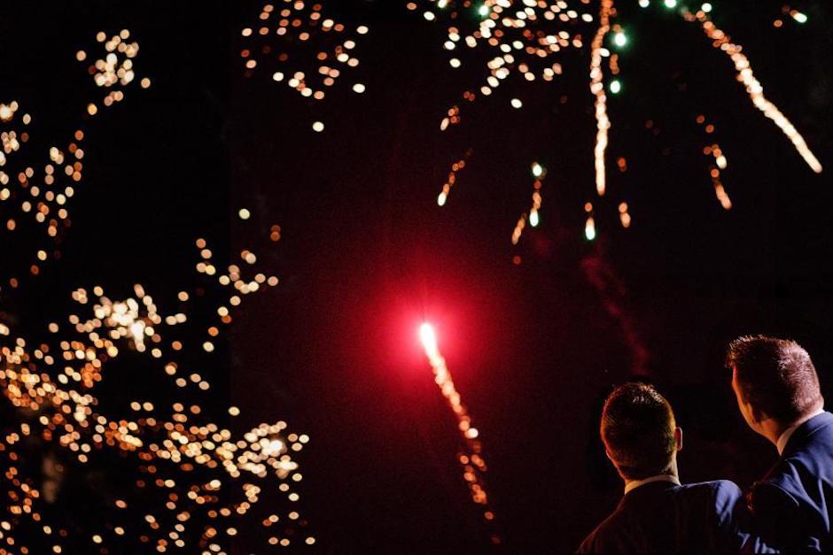 fireworks photo memories with two grooms.