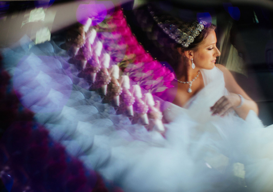 Bride in limo with angles and curves effect.
