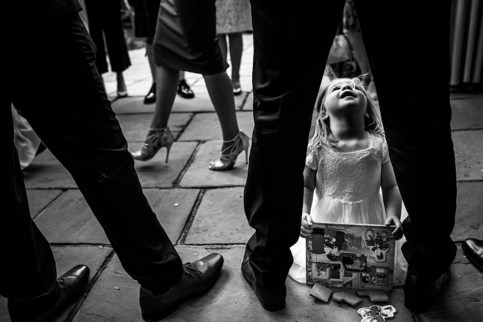 documentary image of little girl at wedding reception