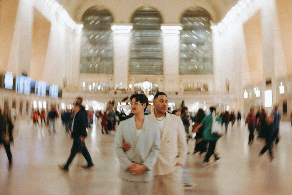 portrait composition of two men at Grand Central Station in NYC.