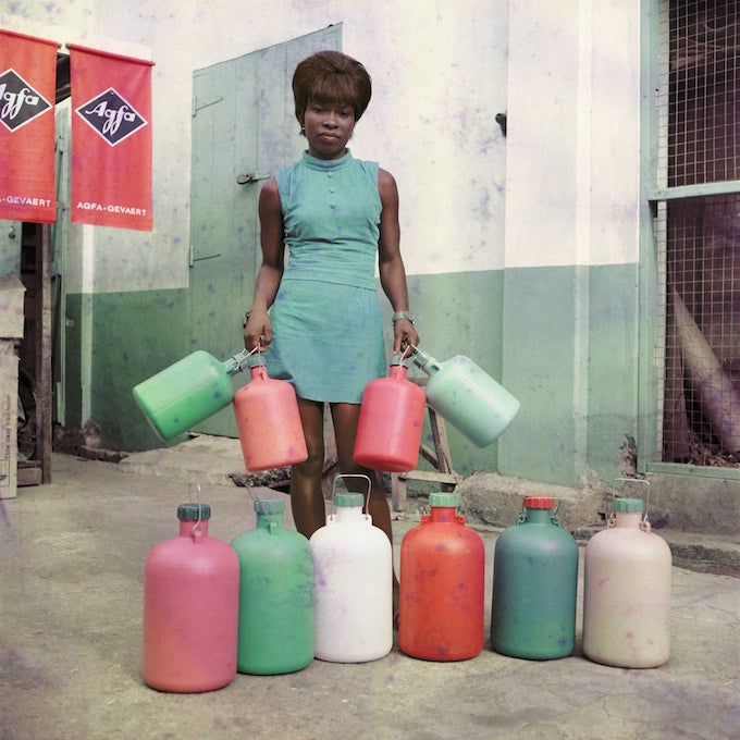 From vintage to new, here's your coast to coast guide of fourteen photography exhibitions going on this summer.